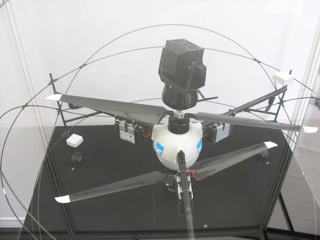 File:UAV EMT FANCOPTER.jpg - a model of a small airplane in a glass case
