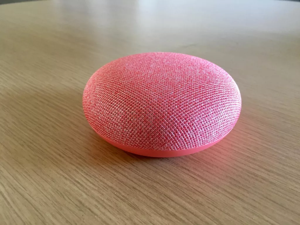 Google home mini pink (39570171115) - a pink ball on a table